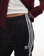adidas Originals Firebird track pants in black