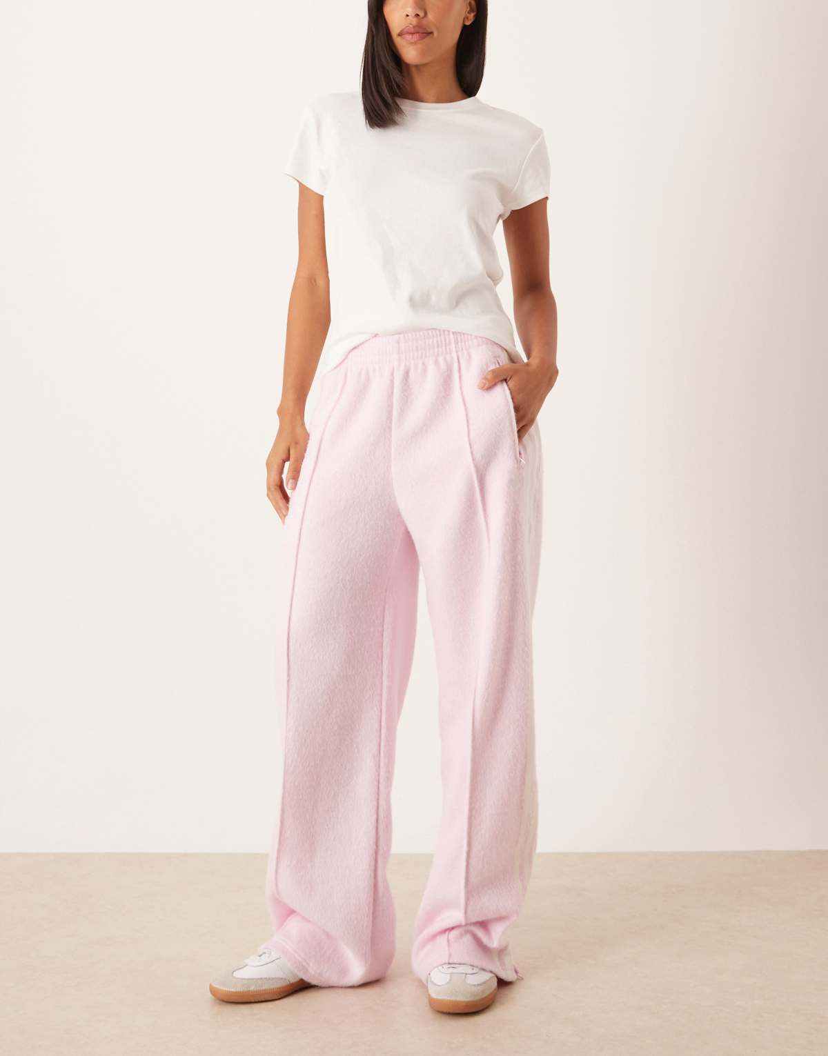 adidas Originals Firebird fluffy track pants in pink, front view
