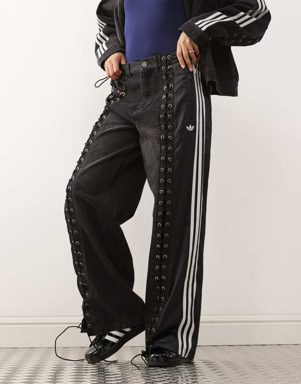 adidas Originals firebird denim jeans in black, side view