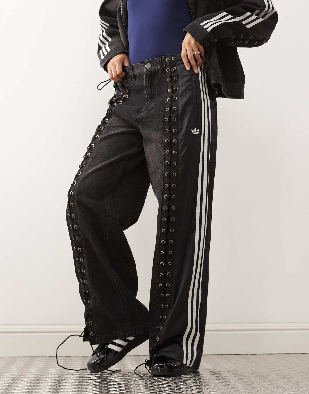 adidas Originals firebird denim jeans in black, side view