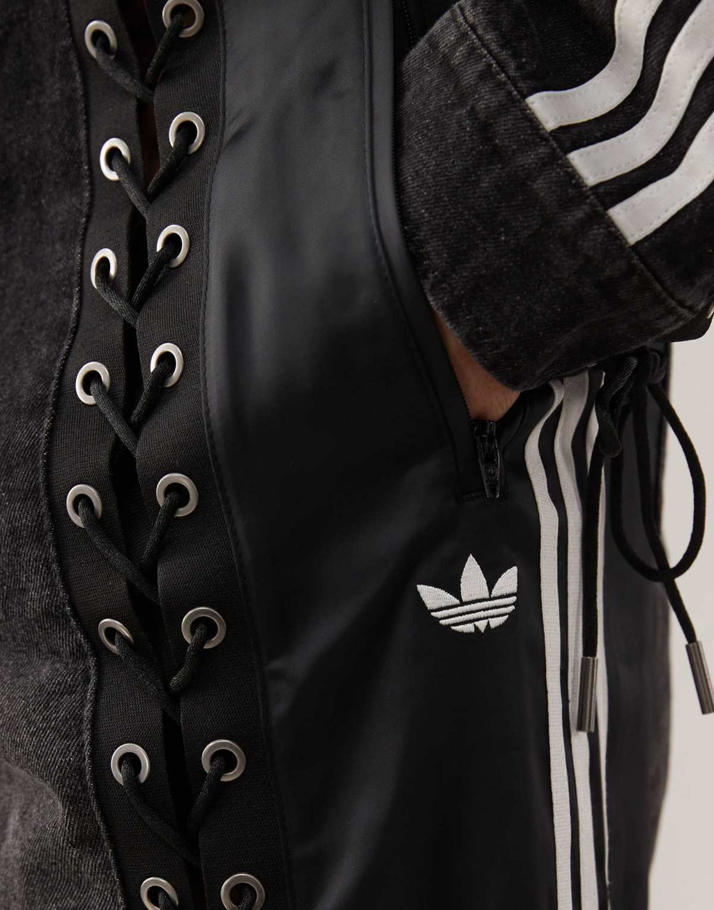 adidas Originals firebird denim jeans in black, hem detail view