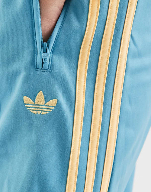 adidas Originals Firebird loose track pants in turquoise and yellow, view 2