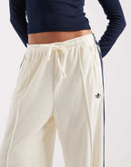 adidas Originals terry towel track pants in cream white, back view