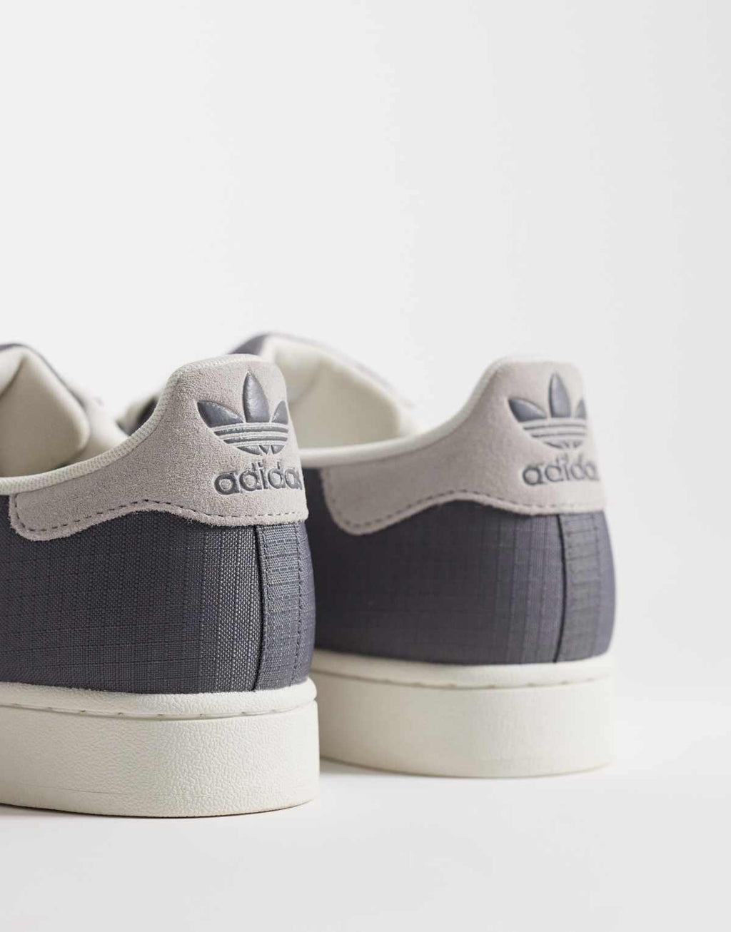 adidas Originals Superstar II trainers in grey and white, side view