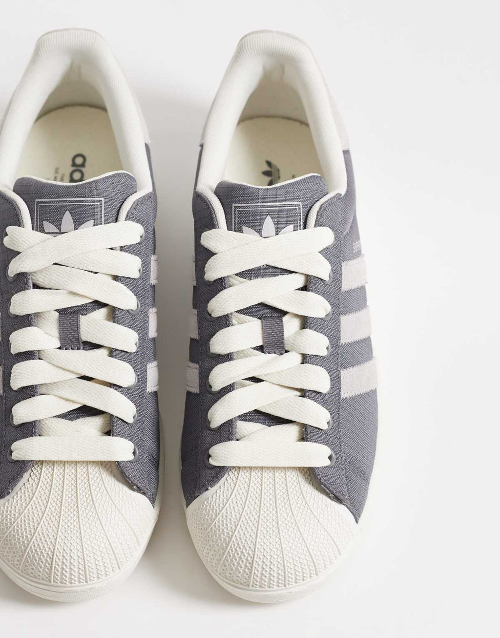 adidas Originals Superstar II trainers in grey and white, back view