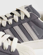 adidas Originals Superstar II trainers in grey and white, top view