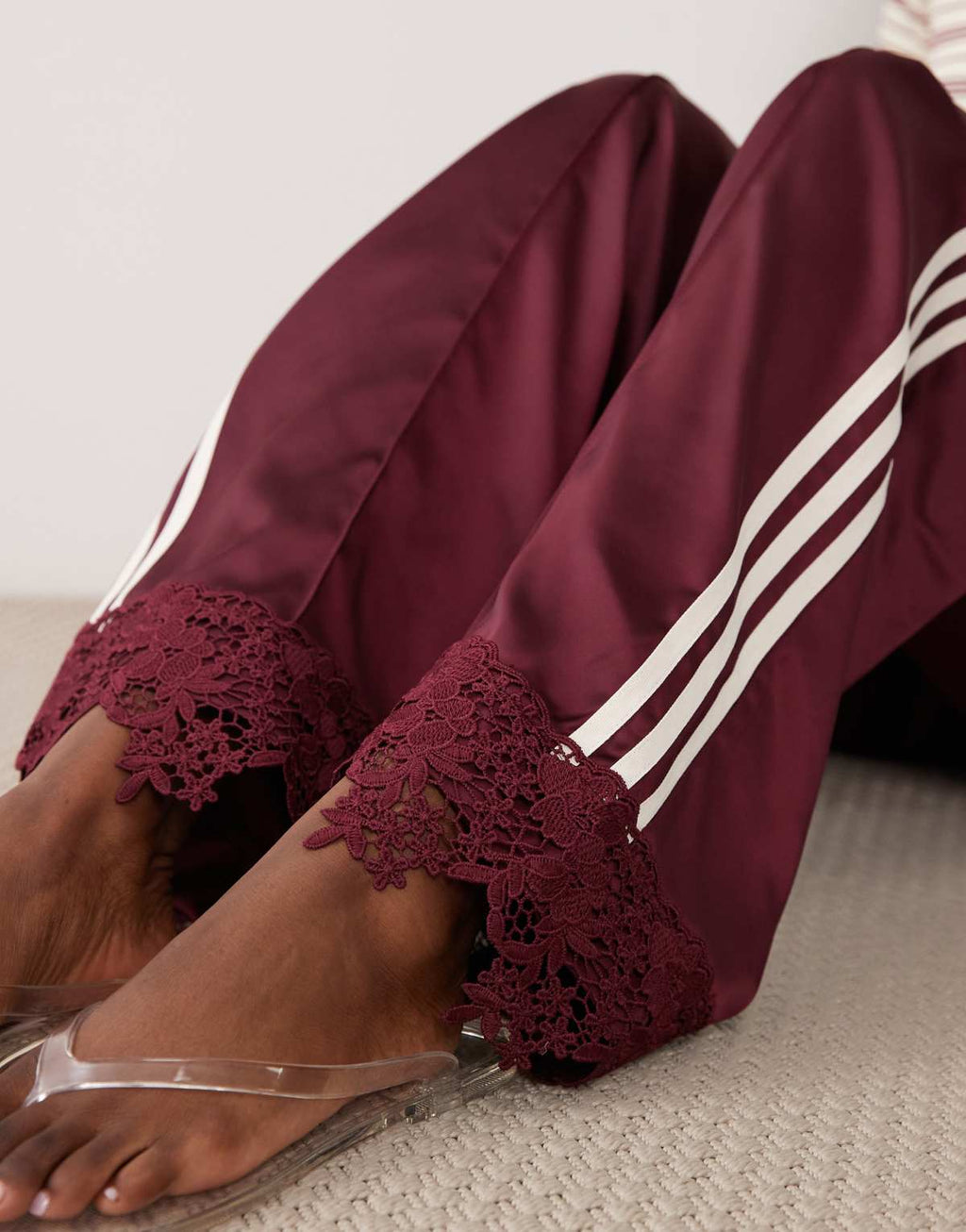 adidas Originals satin Firebird track pants in burgundy, back view