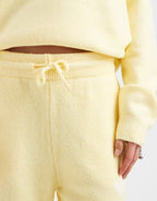 adidas Originals knitted wide leg track pants in butter yellow