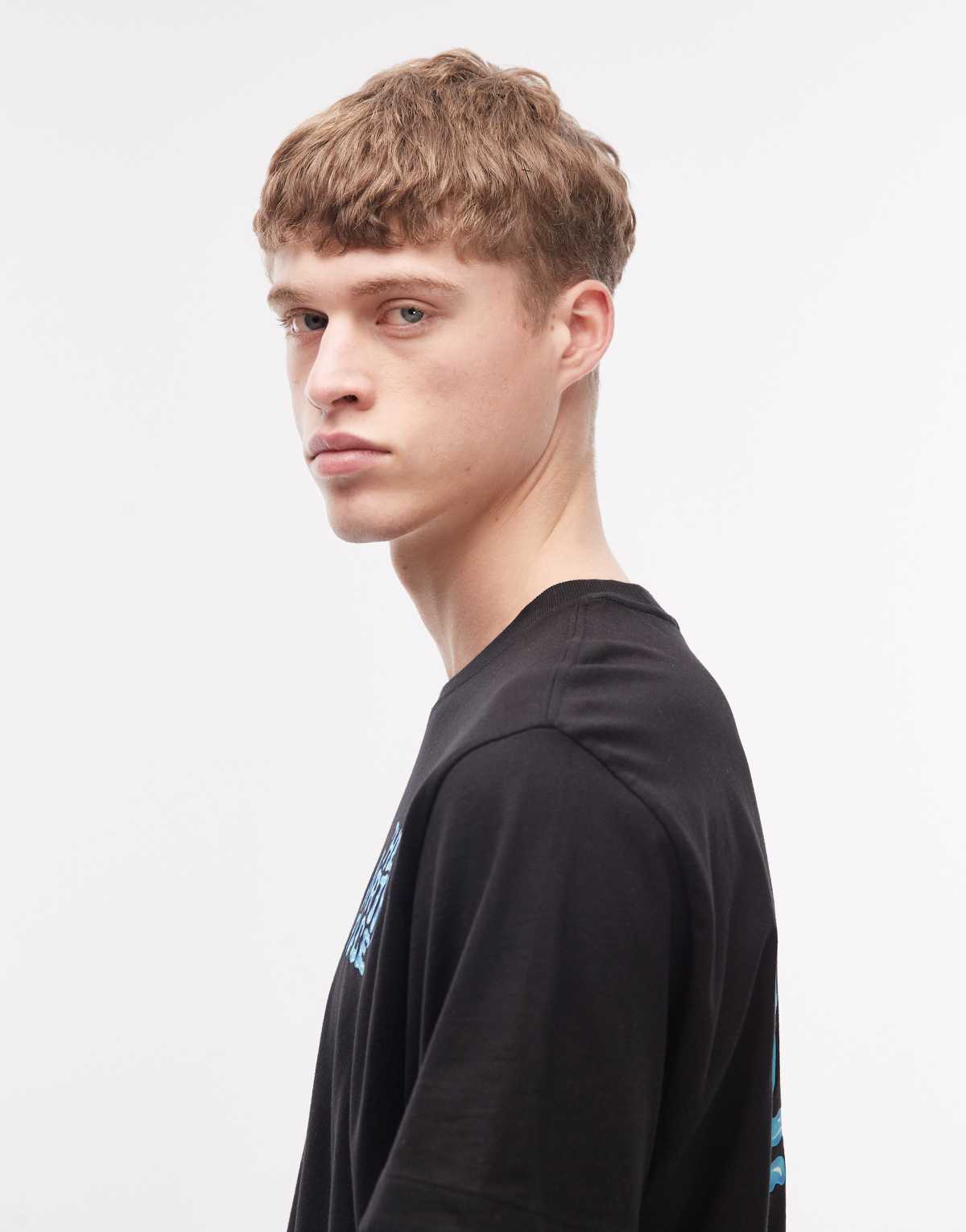 The North Face Drip Logo relaxed backprint t-shirt in black, alternate view