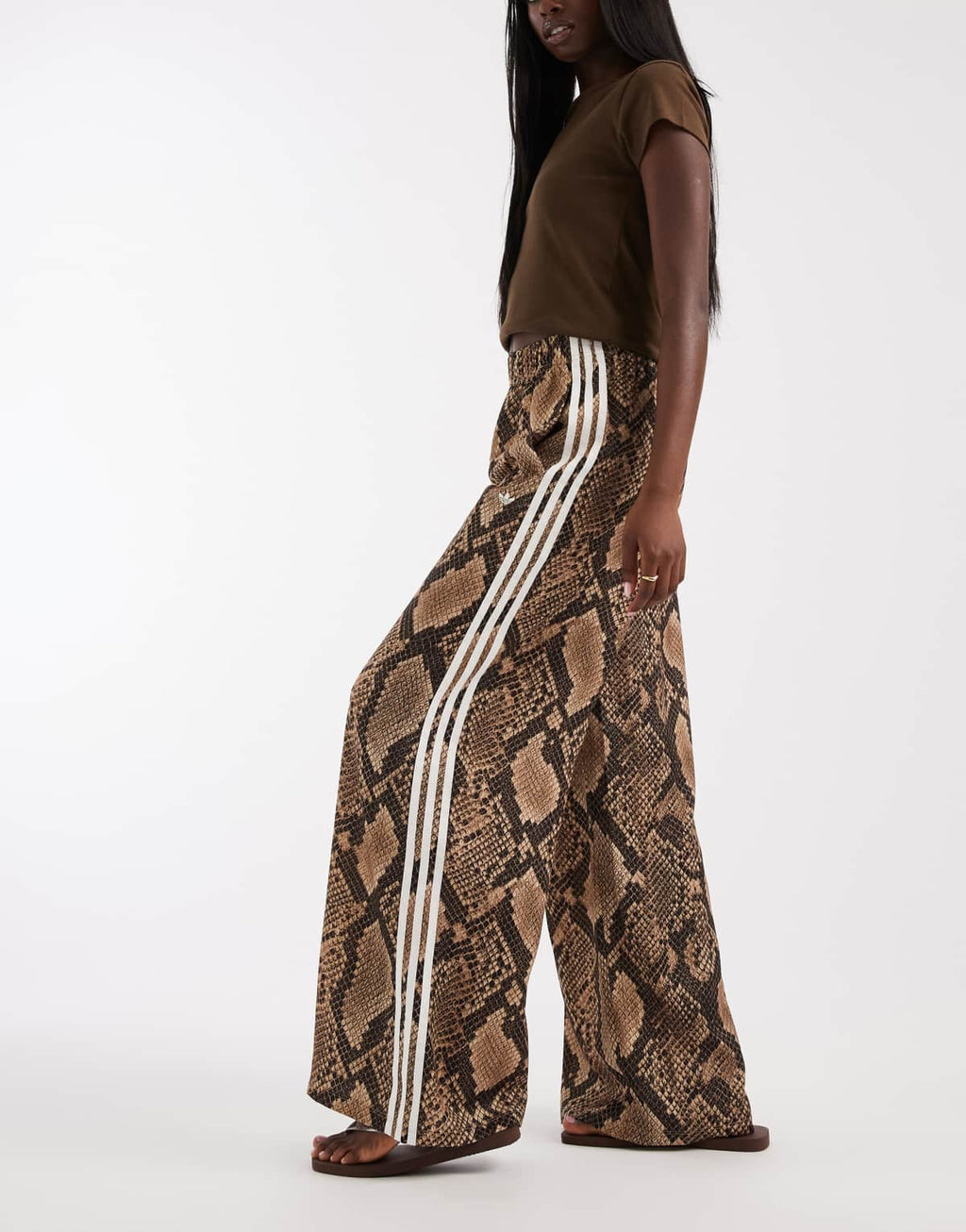 adidas Originals wide leg satin track pants in light brown snake, front view