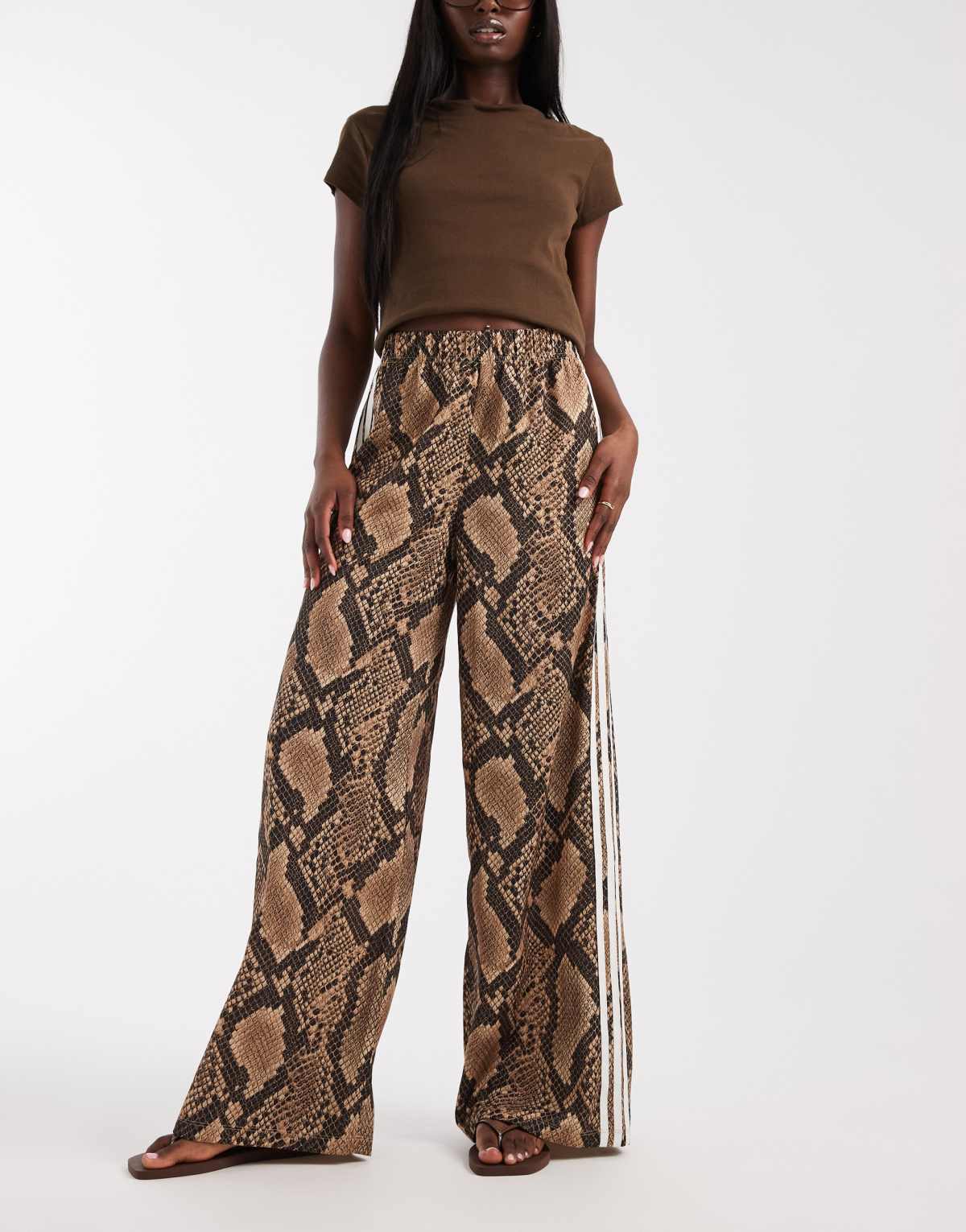 adidas Originals wide leg satin track pants in light brown snake, side view