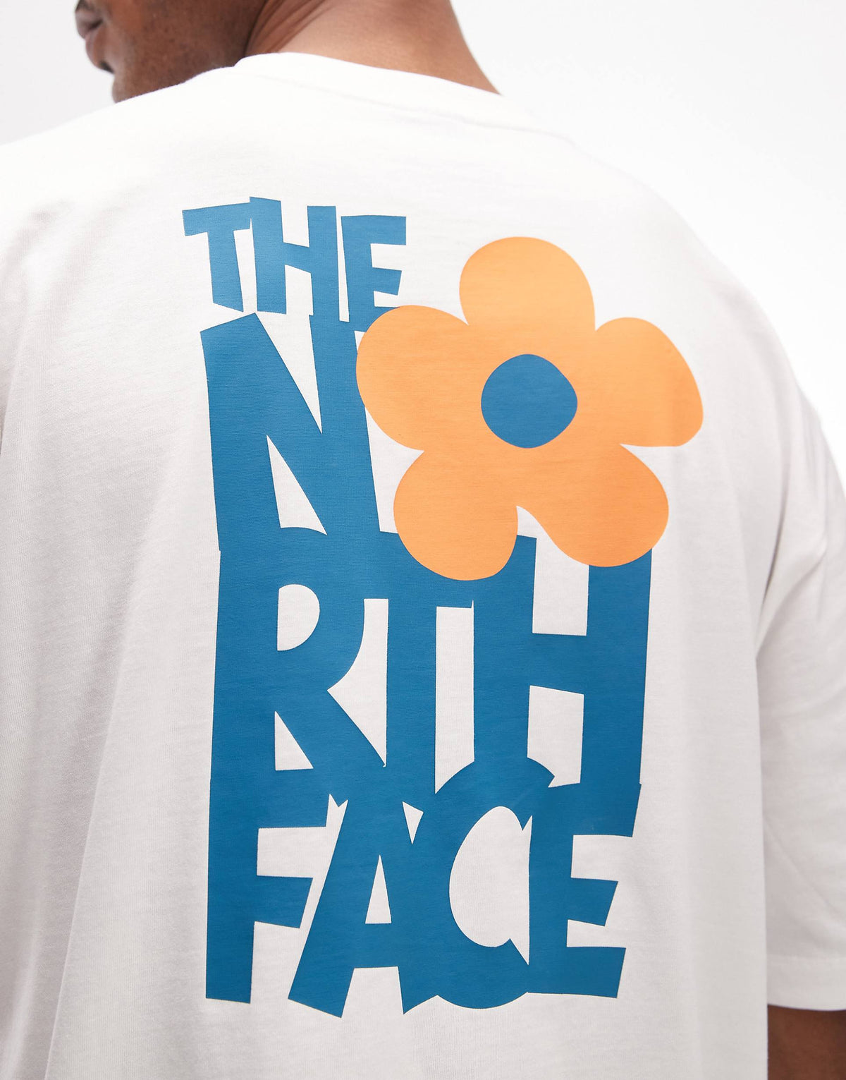 The North Face Flower backprint t-shirt in white.