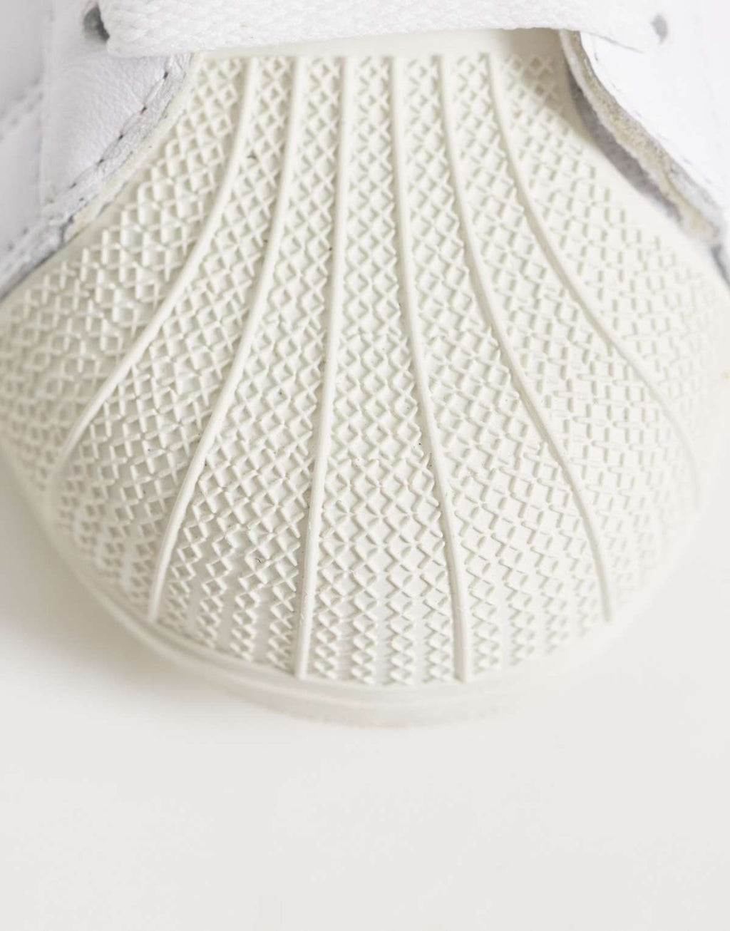 adidas Originals Superstar II lo pro trainers in white and black, back view