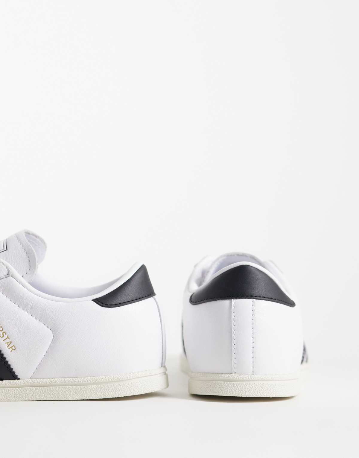 adidas Originals Superstar II lo pro trainers in white and black, top view
