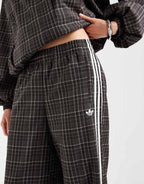 adidas Originals check track bottoms in night brown, detail view