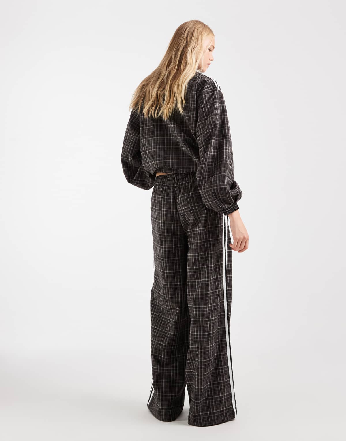 adidas Originals check track bottoms in night brown, fabric detail view