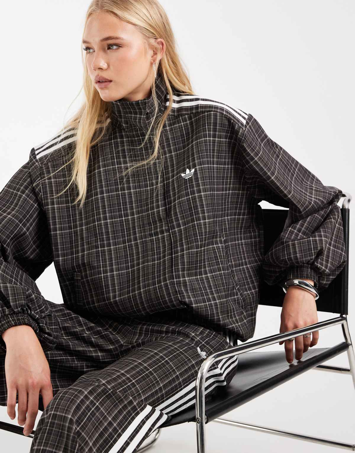 adidas Originals check track top in night brown, front view