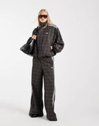 adidas Originals check track top in night brown, side view