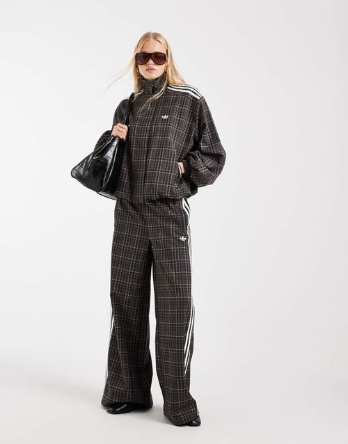 adidas Originals check track top in night brown, side view