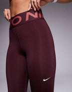 Nike Pro Training sculpt high waisted leggings in burgundy