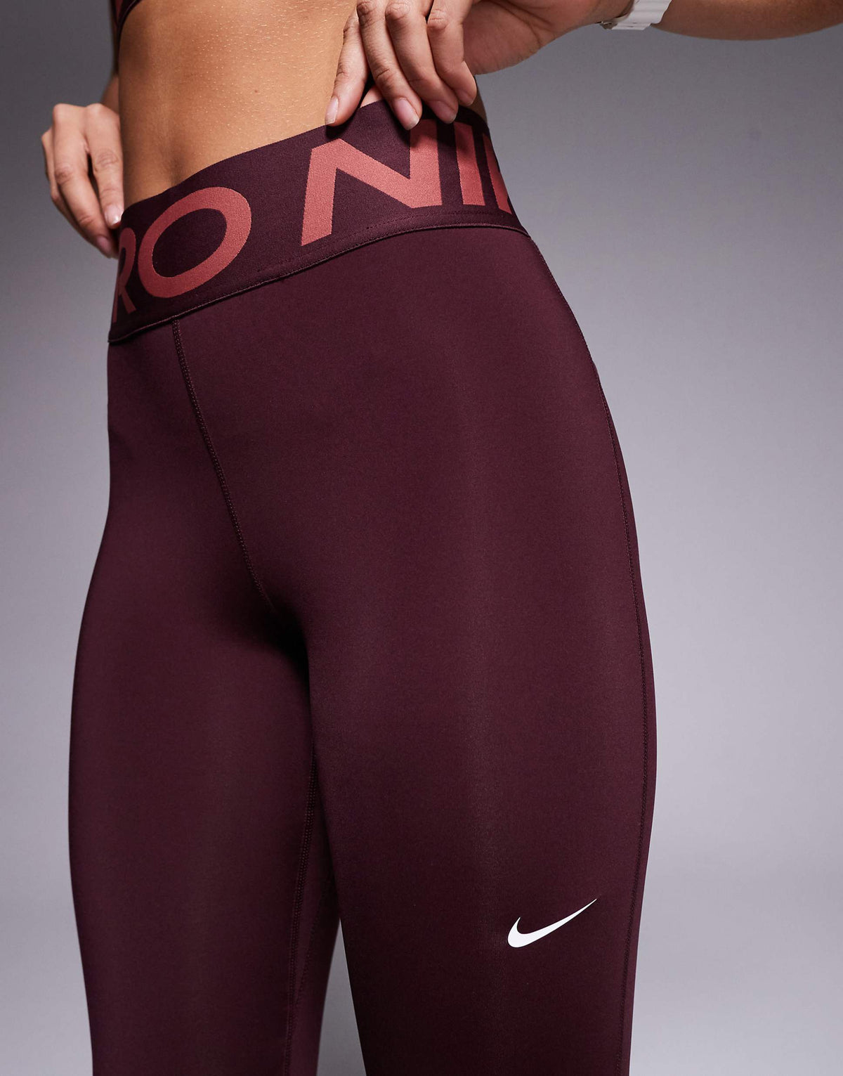 Nike Pro Training sculpt high waisted leggings in burgundy