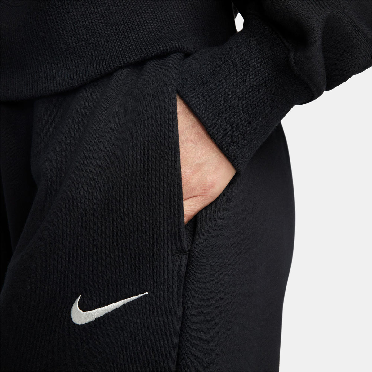 Nike Phoenix Fleece women's 1/2-zip cropped sweatshirt in black, detail view