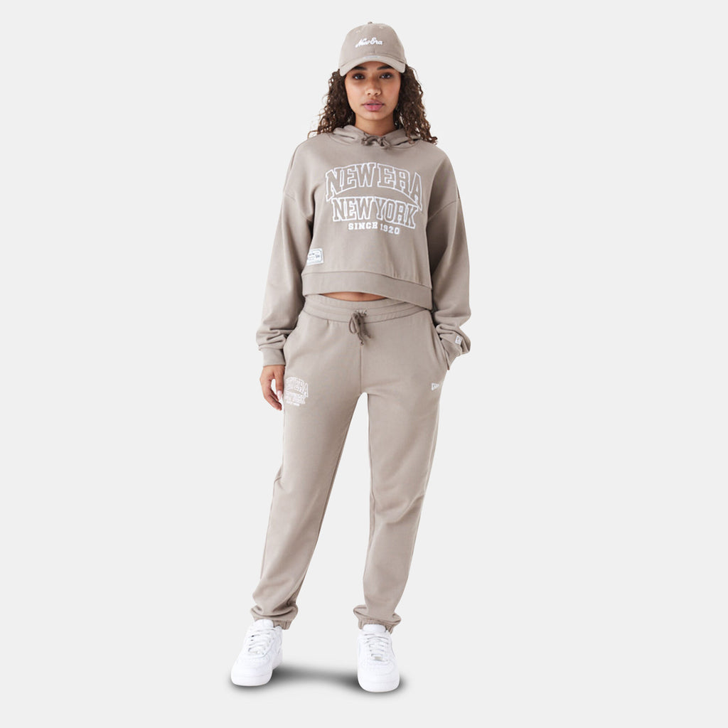 New Era women's Arch Wordmark cropped hoodie in beige, back view